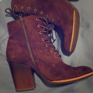 Burgundy suede booties.
